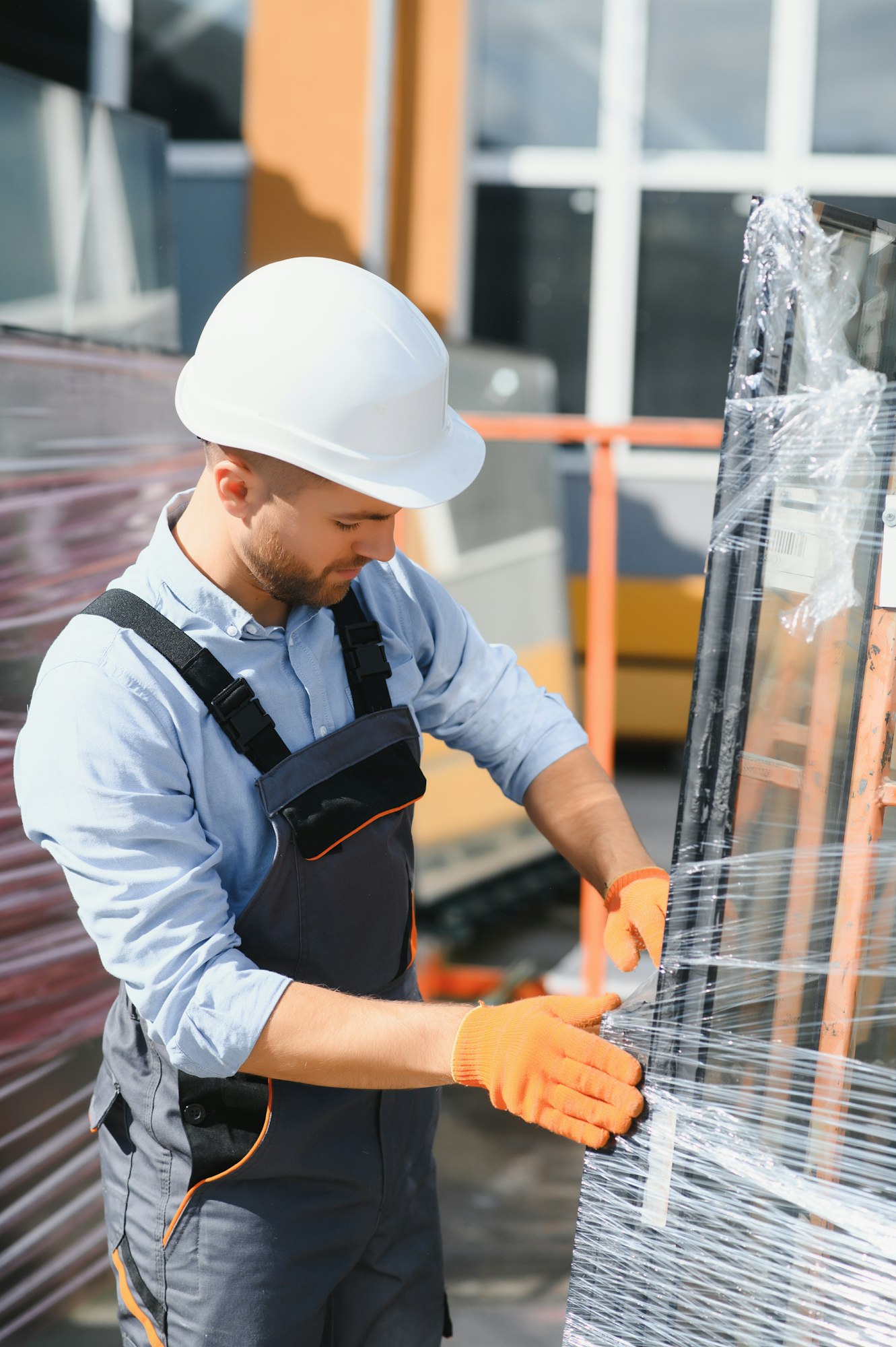 At the factory for the production of windows and doors of aluminum and PVC